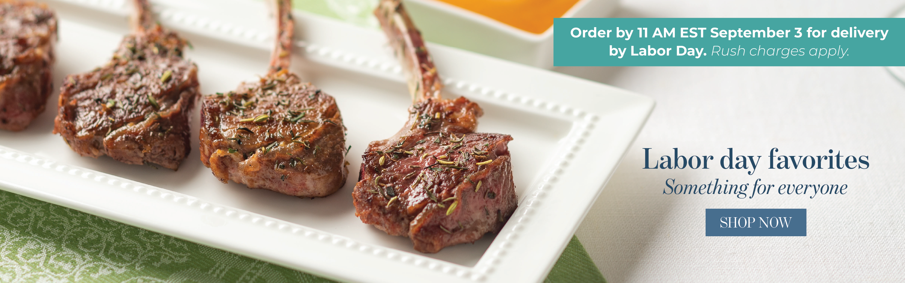 Four cooked lamb chops on a white rectangular serving platter, with promotional text that reads Order by 11am on September 3 for delivery by Labor Day.