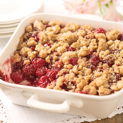 A bright, delicious cherry crisp freshly baked